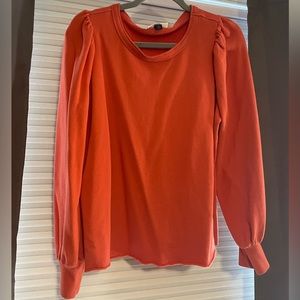 Orange sweater with puff sleeves